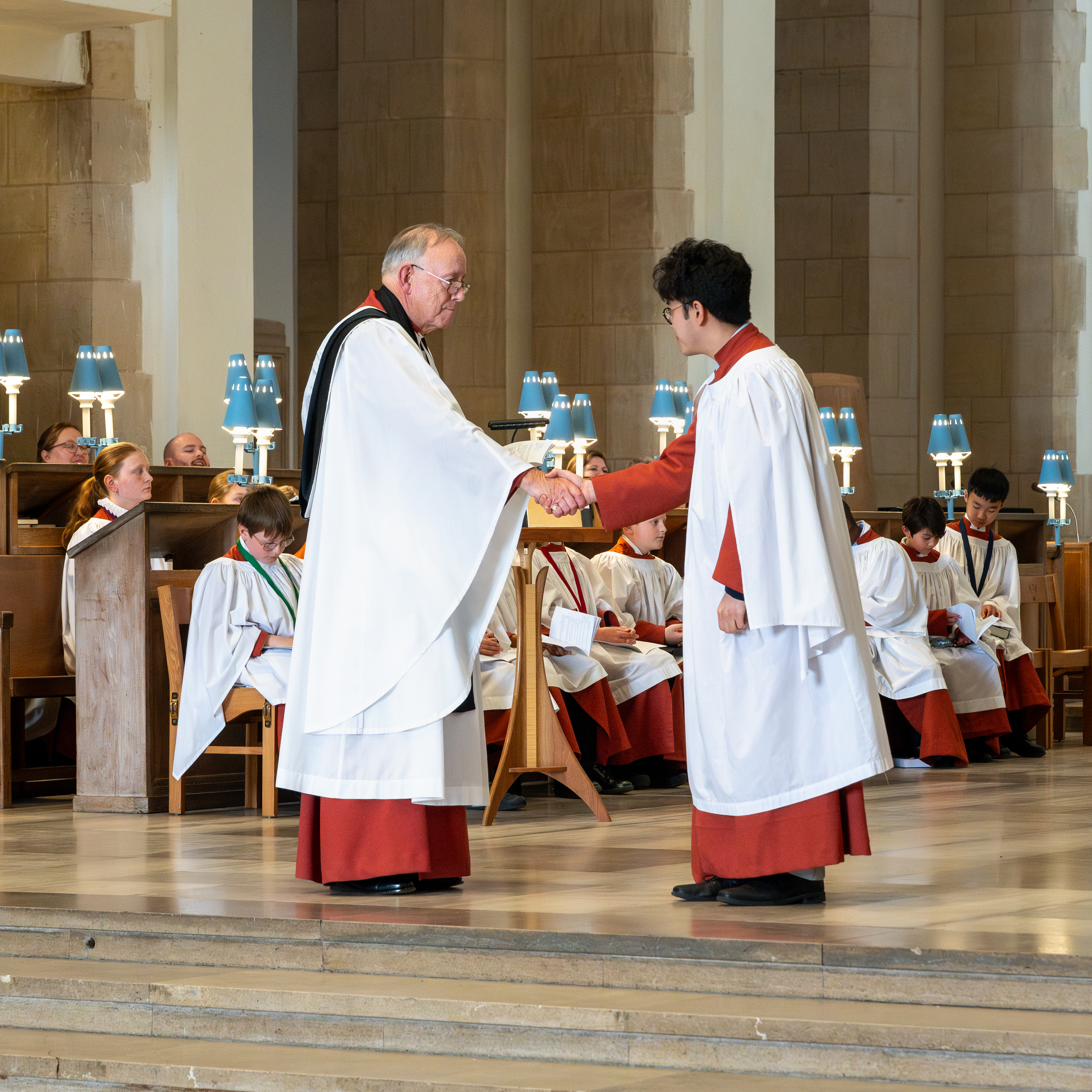 Interim Dean Stuart Beake shaking hands with Jeremy